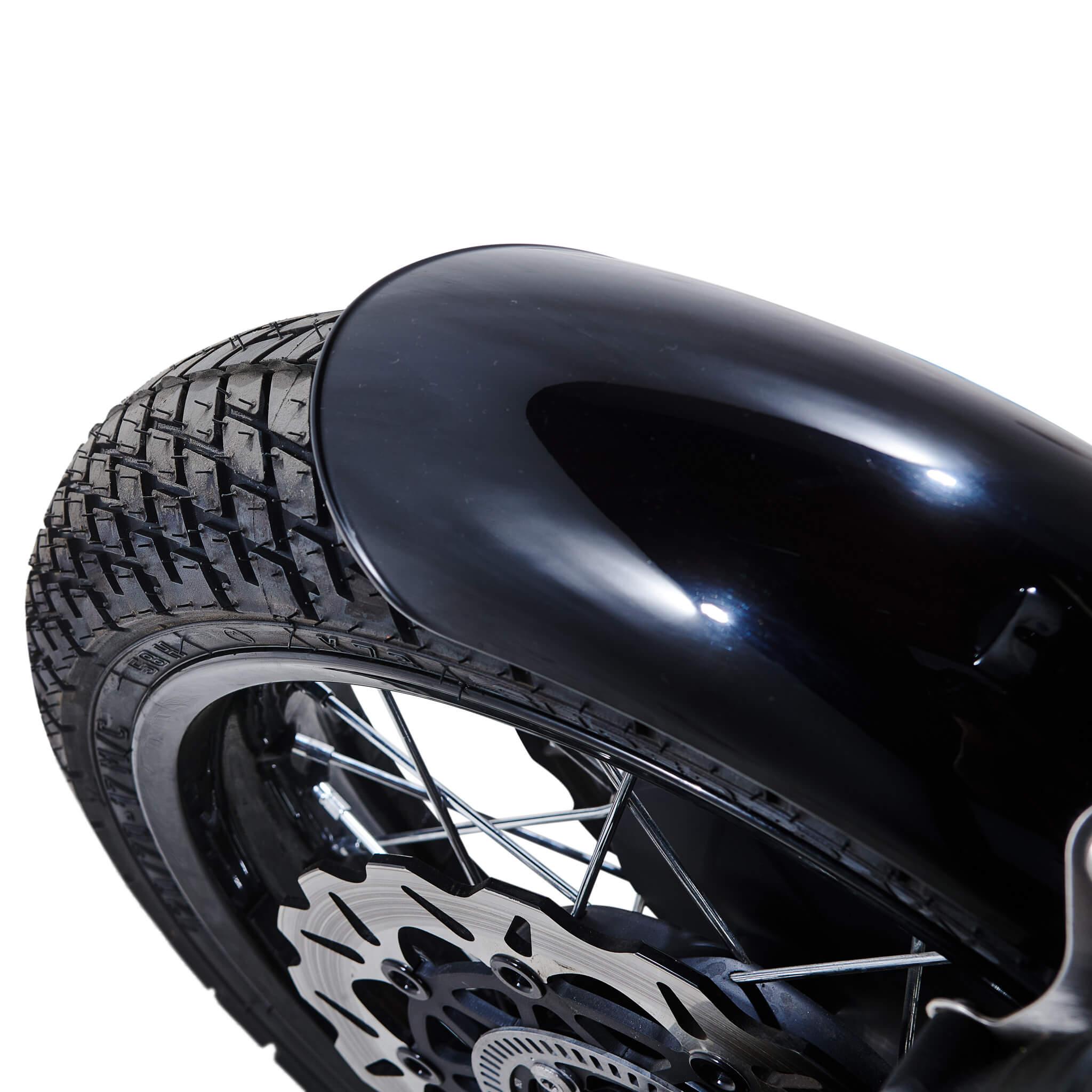 Gloss black Triumph front fender over a knobbly tyre with the Galfer wave rotor visible below