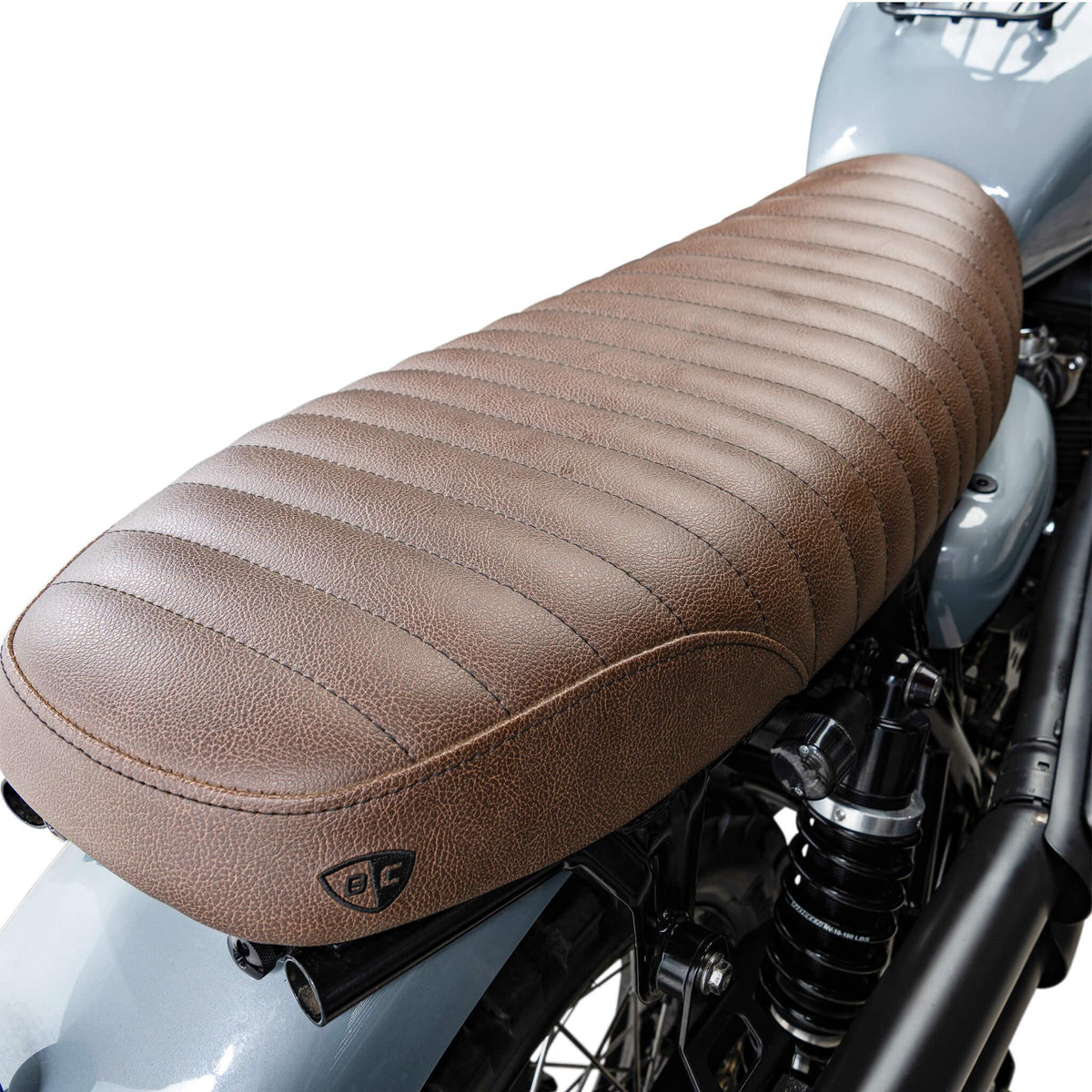 Brown marine grade vinyl and Tuck N Roll stitching close up